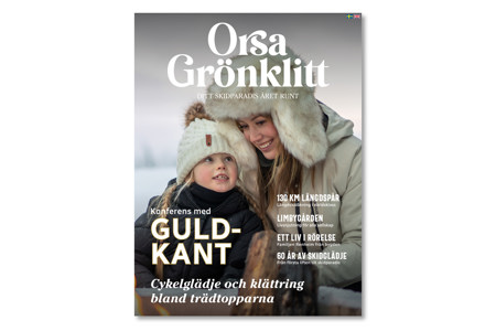 Affisch för Orsa Grönklitt med kvinna och barn i vintermiljö samt text om aktiviteter och skidåkning året runt.